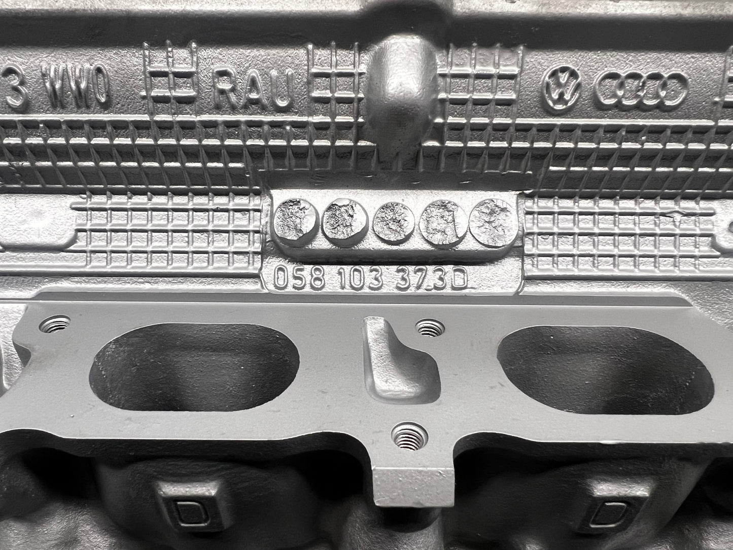Casting number of cylinder head for a Audi / Volkswagen 1.8L Turbo DOHC Casting #058103373D 20 Valve