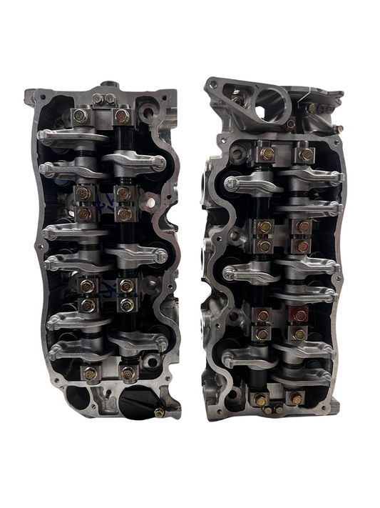 Top view of cylinder head for a NEW Mazda 3.0L Casting #JE06 (SOLD IN PAIR)